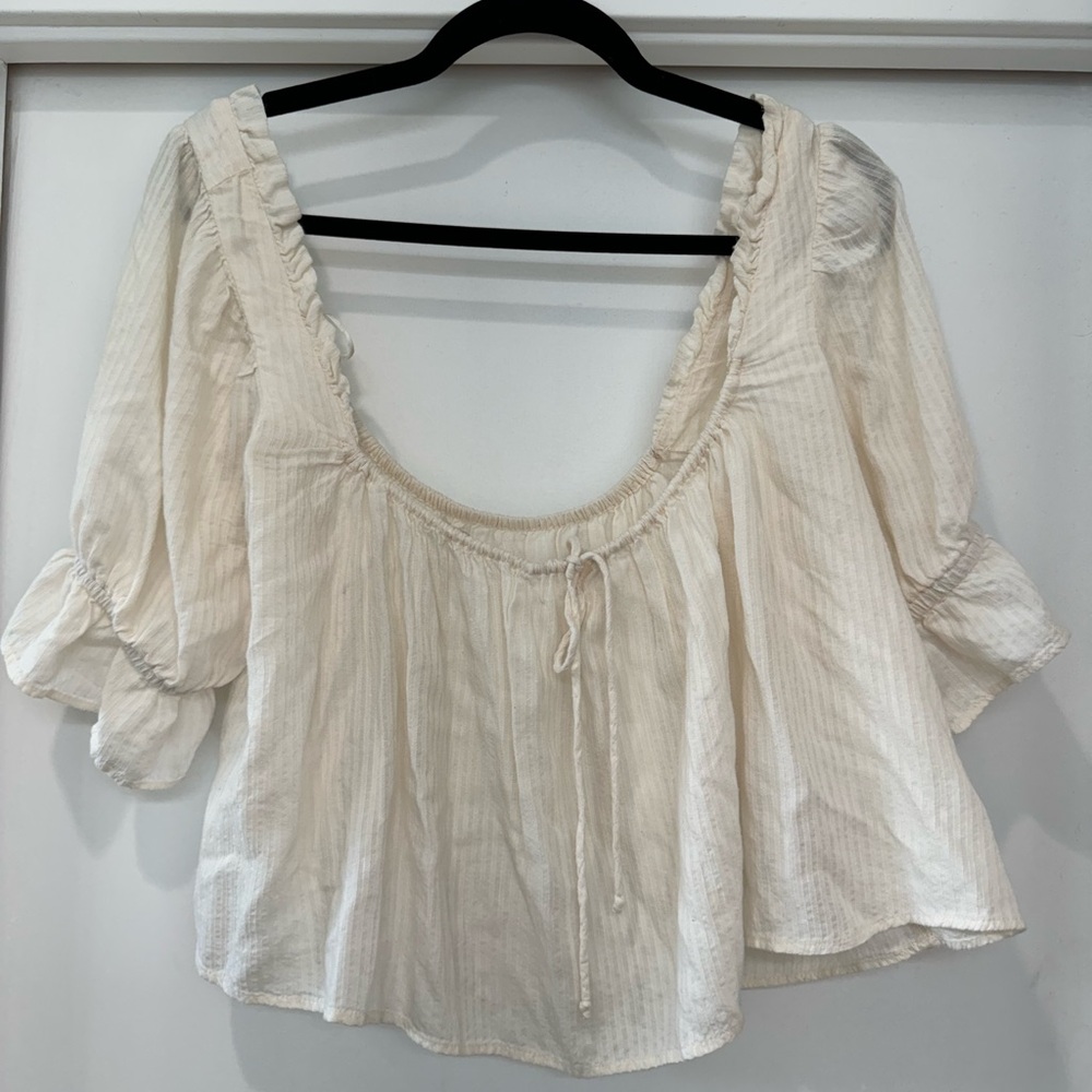 Urban Outfitters | cream top with front tie | size L